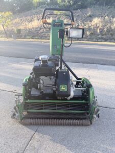 John Deere 220c with groomer